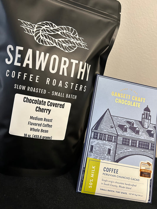 Seaworthy slow roasted, small batch, low acid coffee. 1 pound bag of Chocolate Covered Cherry flavored coffee.  Bar of Gansett Craft Chocolates Coffee Milk White Chocolate Bar.