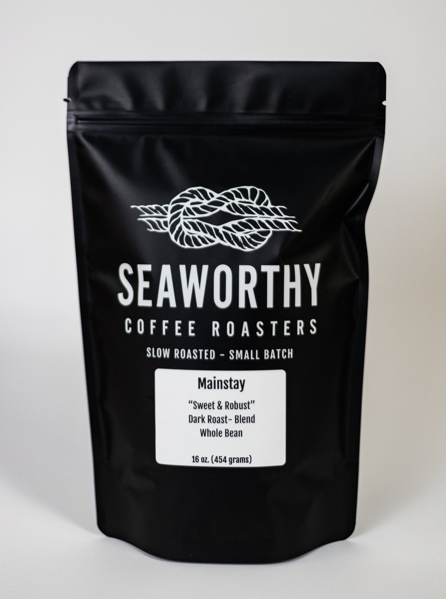 Seaworthy slow roasted, small batch, low acid coffee. 1 pound bag of Mainstay dark roast specialty coffee.