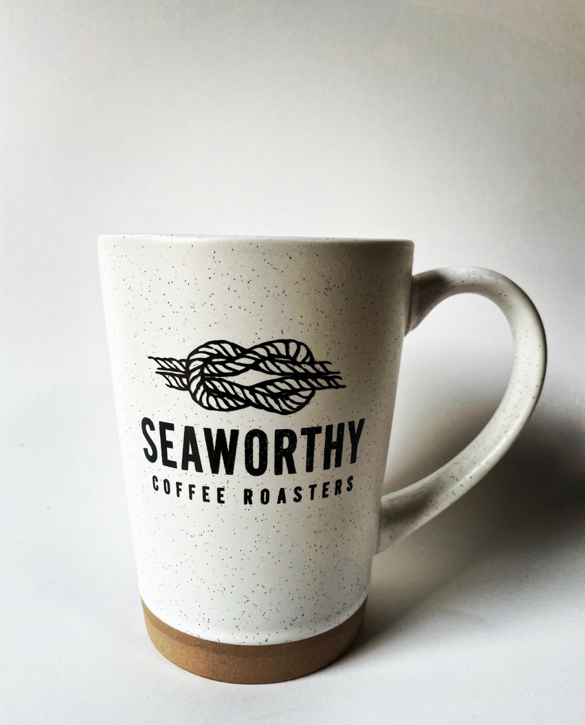 Seaworthy speckled clay coffee mug with big handle.