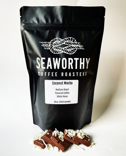 Seaworthy slow roasted, small batch, low acid coffee. 1 pound bag of Coconut Mocha flavored coffee.  Chocolate bar and shredded coconut.