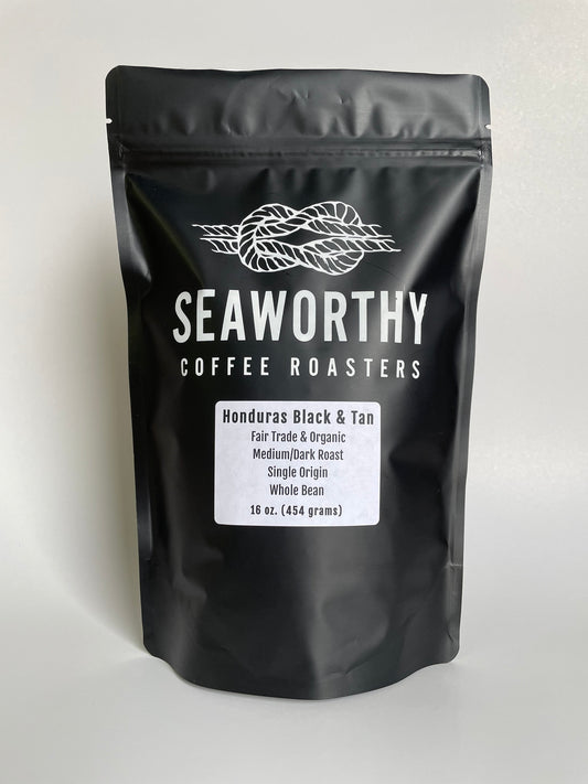 Seaworthy slow roasted, small batch, low acid coffee. 1 pound bag of Honduras Black and Tan medium and dark roast specialty coffee.