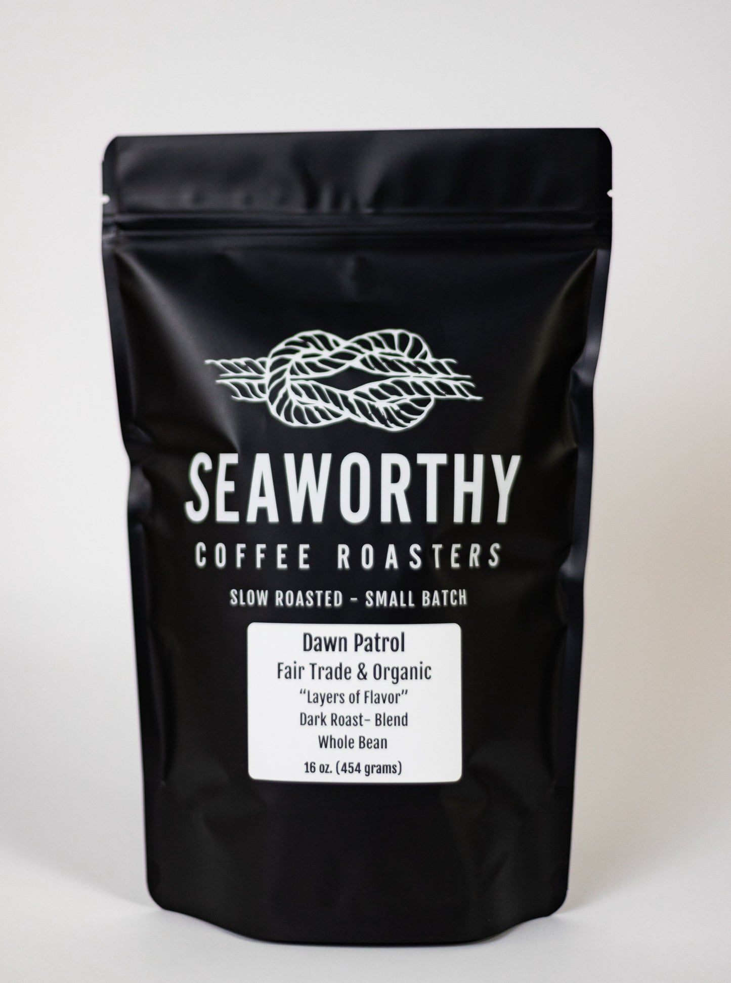 Seaworthy slow roasted, small batch, low acid coffee. 1 pound bag of Dawn Patrol dark roast specialty coffee blend.