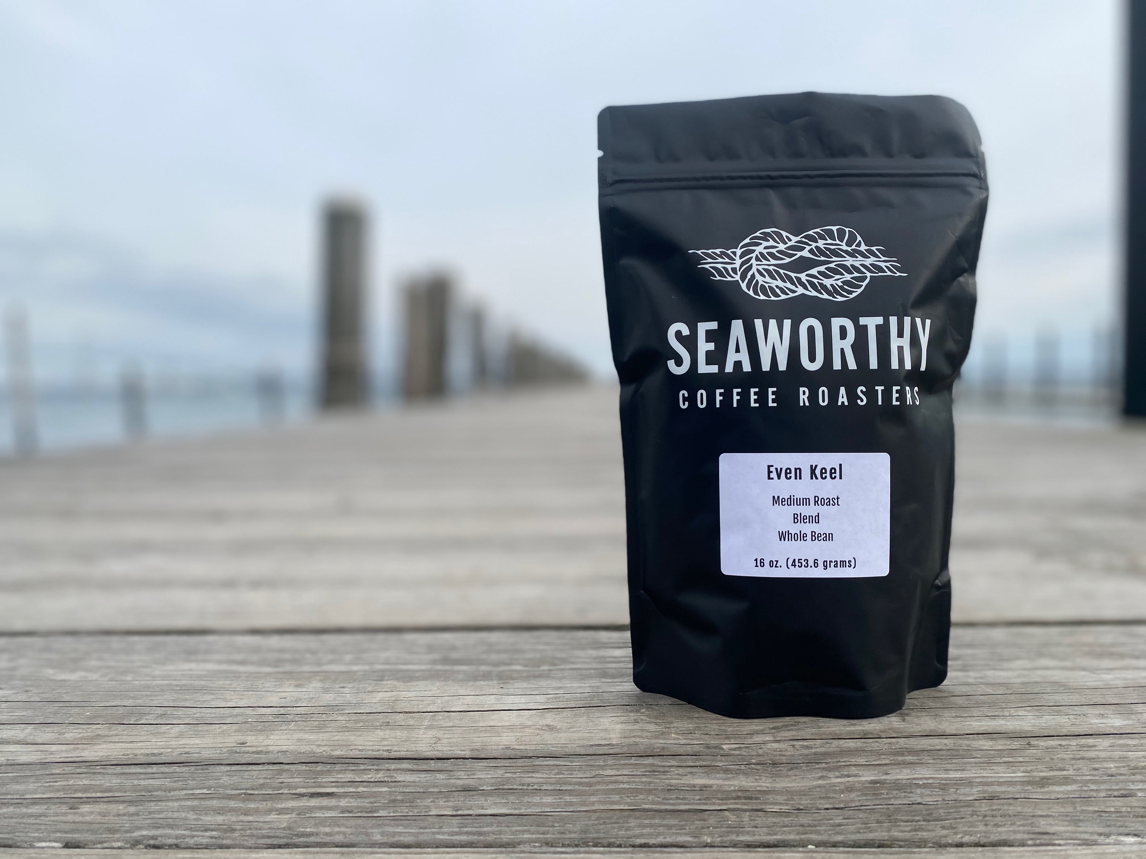 1 pound of Even Keel medium roast blend on a dock in Jamestown Rhode Island