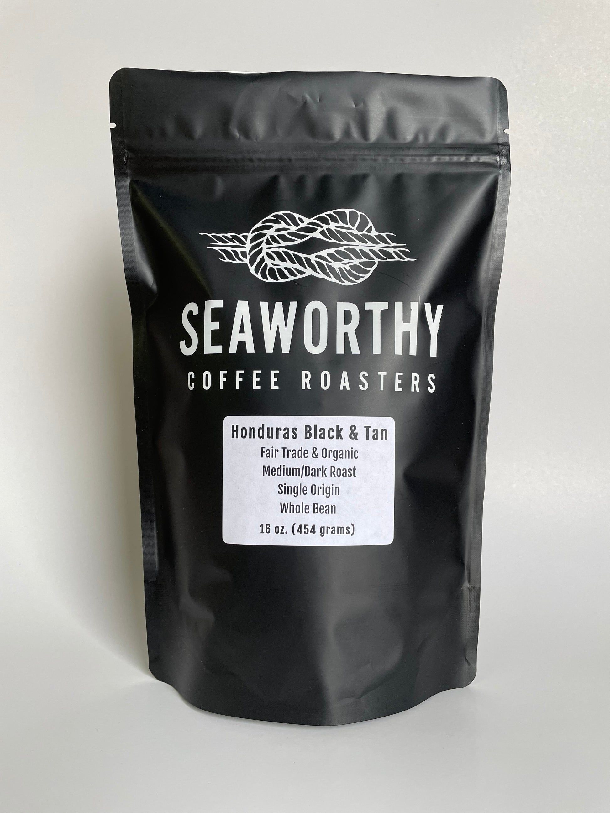 This roast is a mixture of medium and slightly darker medium roasted single origin Honduran coffee beans creating the unique "black and tan" appearance.  Notes of sweet milk chocolately goodness and subtle tones of stone fruit with a medium acidity and a lighter body make this an excellent cup of coffee.  